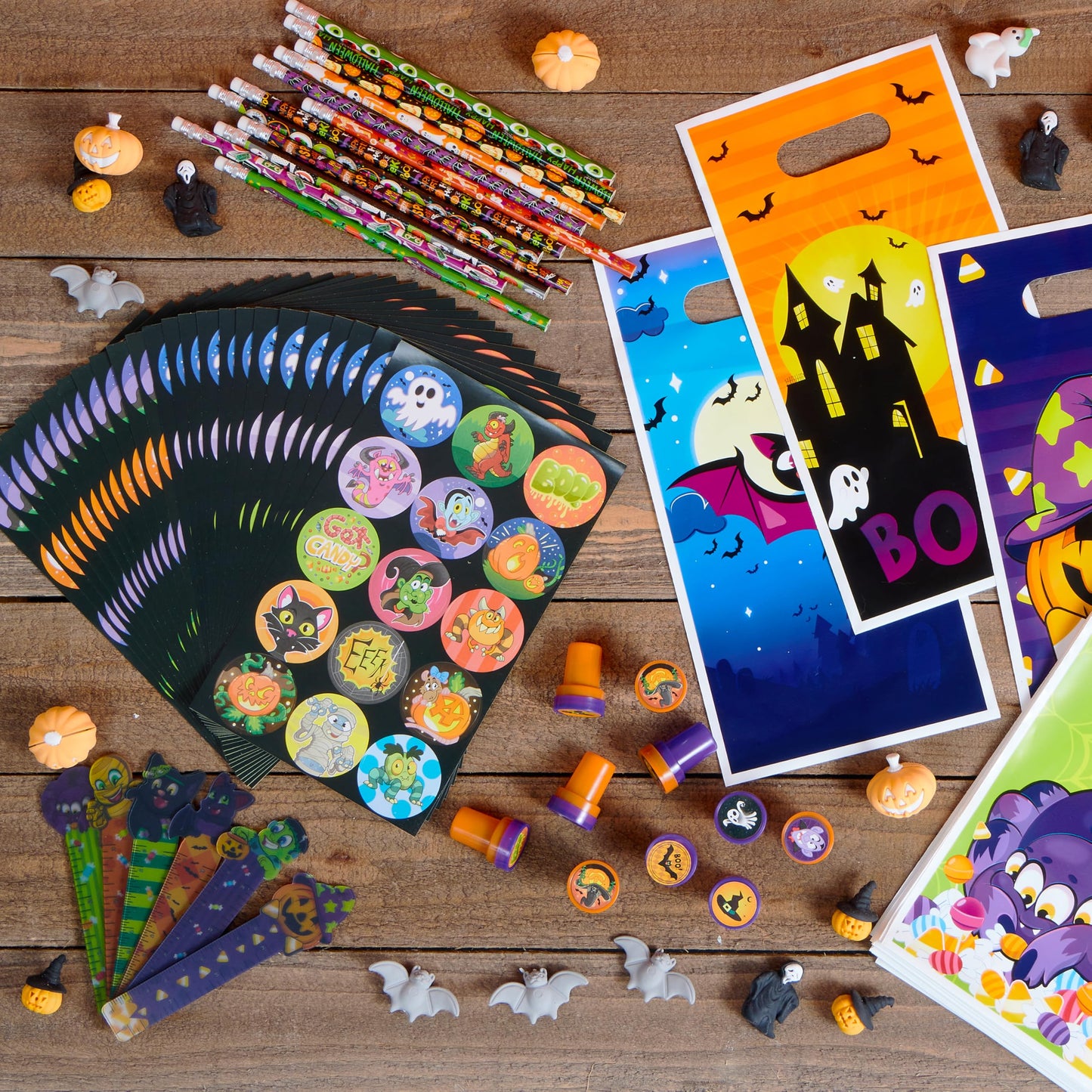JOYIN 144 Pieces 24 Pack Assorted Halloween Themed Stationery Kids Gift Set Trick Treat Prize Party Favor Toy Including Halloween Pencils, Rulers, Stickers, Stamps and Erasers in Trick or Treat Bags